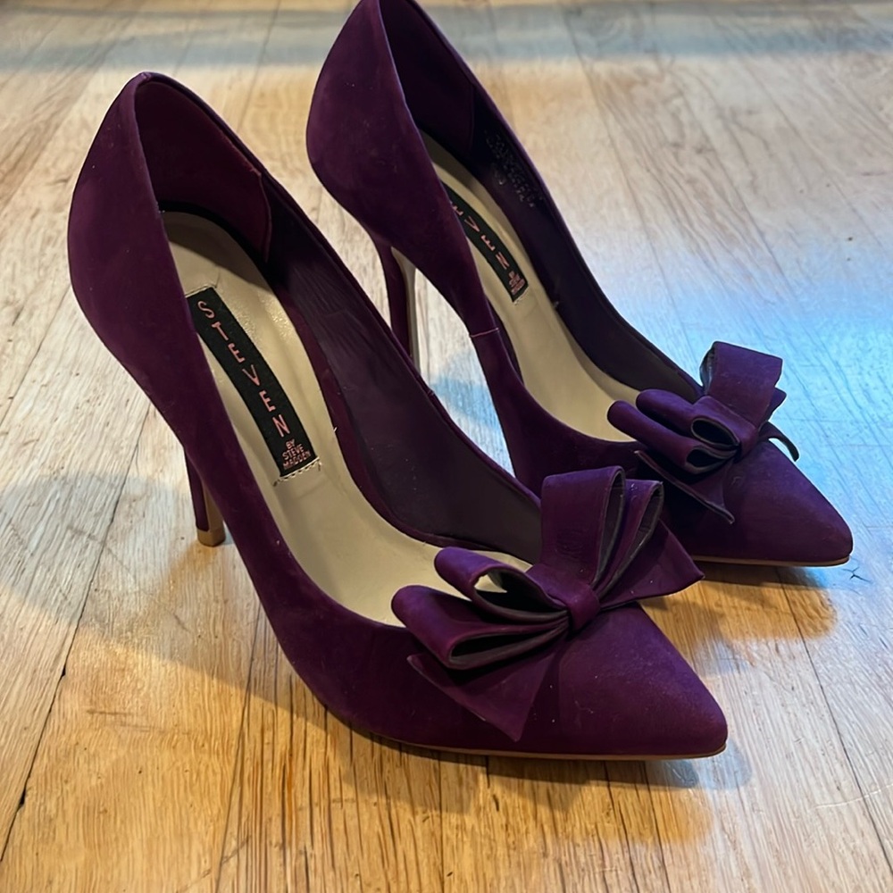 Purple Steve Madden suede heels.